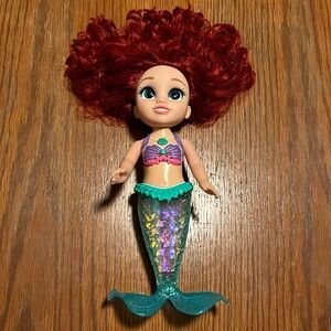 Talking and singing mermaid doll. Like new.